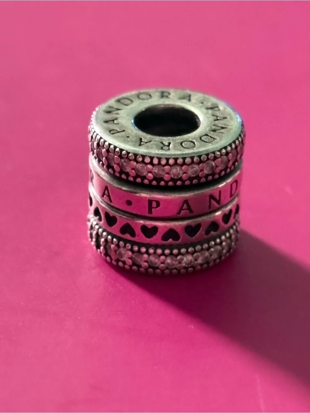 Pandora Sterling Silver Stacked Heart Spacer Charm - Pink Background